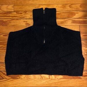 Black tank sweater, would look so cute under a white long sleeved shirt!
